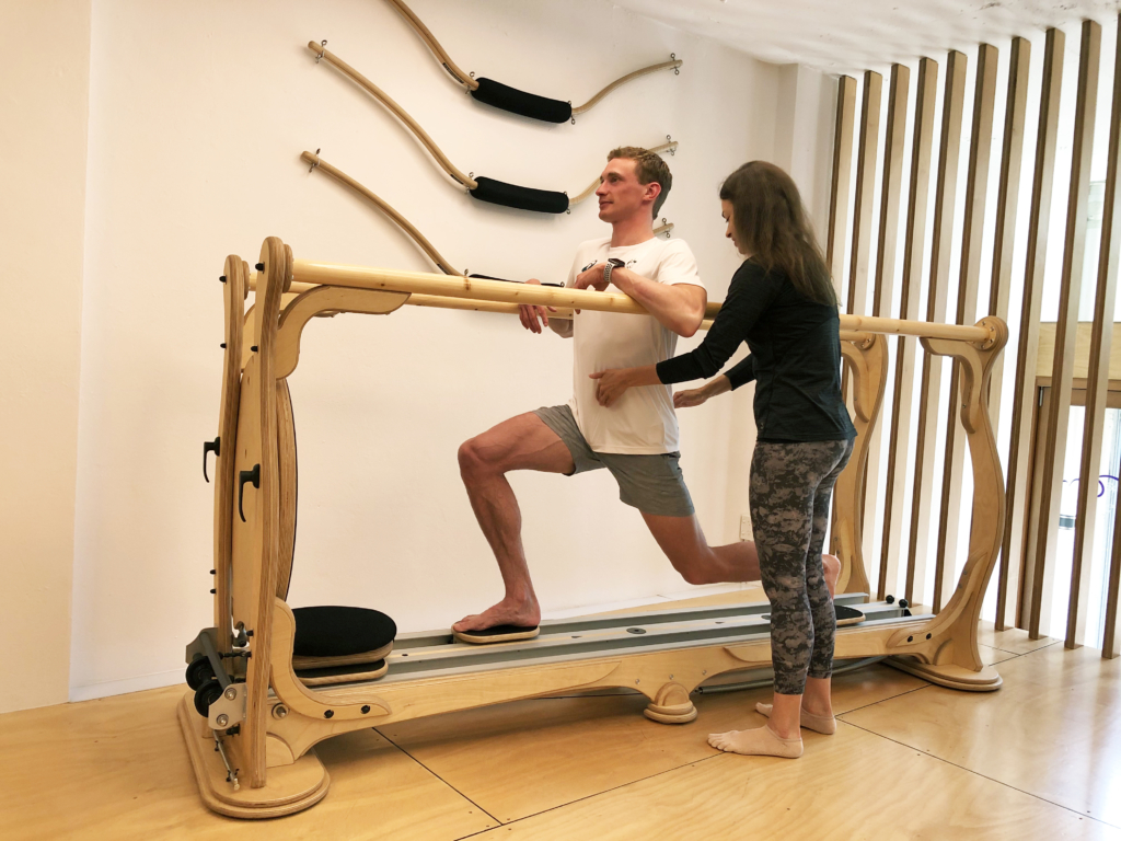 Olympic runner Steven Solomon training with GYROTONIC® Mater Trainer Erika Parisi