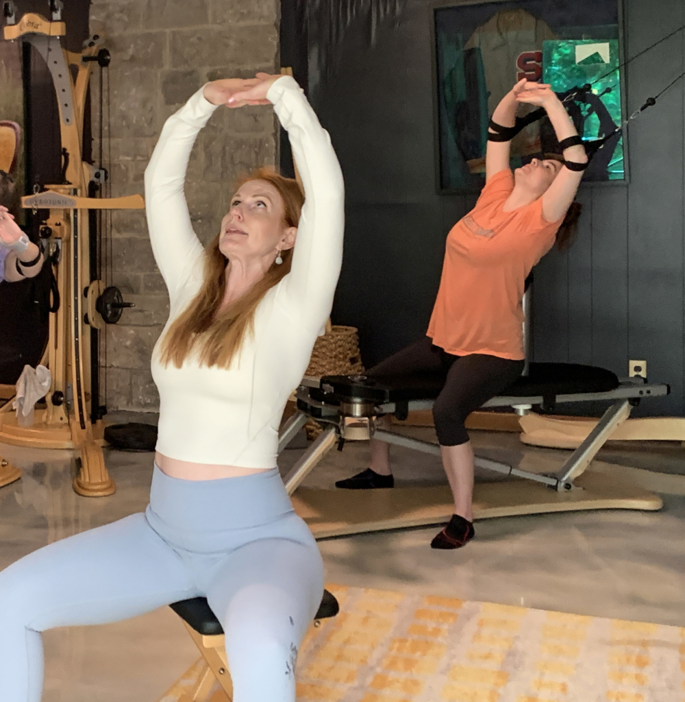 Chandler Moore Sanders, a GYROTONIC® Trainer and Movement Professional, in her home studio