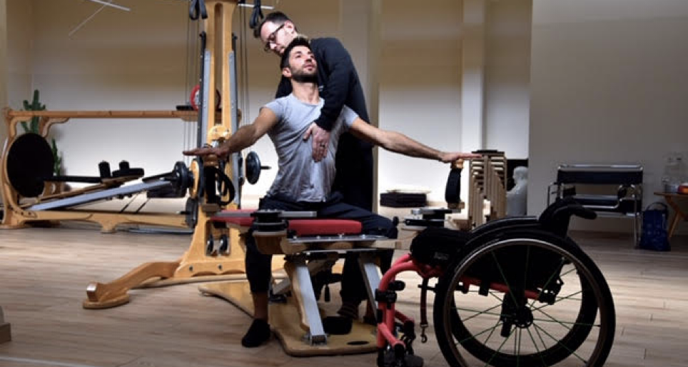 A paraplegic man practicing the GYROTONIC® Method