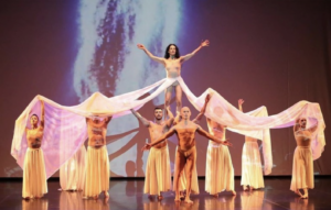 Master Trainer Miriam Barbosa in a professional dance performance