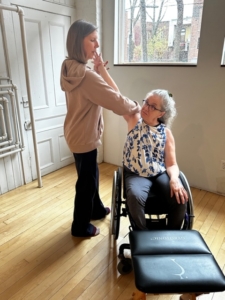 Finding Possibilities: Teacher Training for the GYROKINESIS® Method in a Wheelchair Master Trainer Dana Gringas teacher training with student