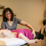 GYROTONIC® Trainer Kate Pagliasotti working with a client, demonstrating the benefits of understanding Polyvagal Theory